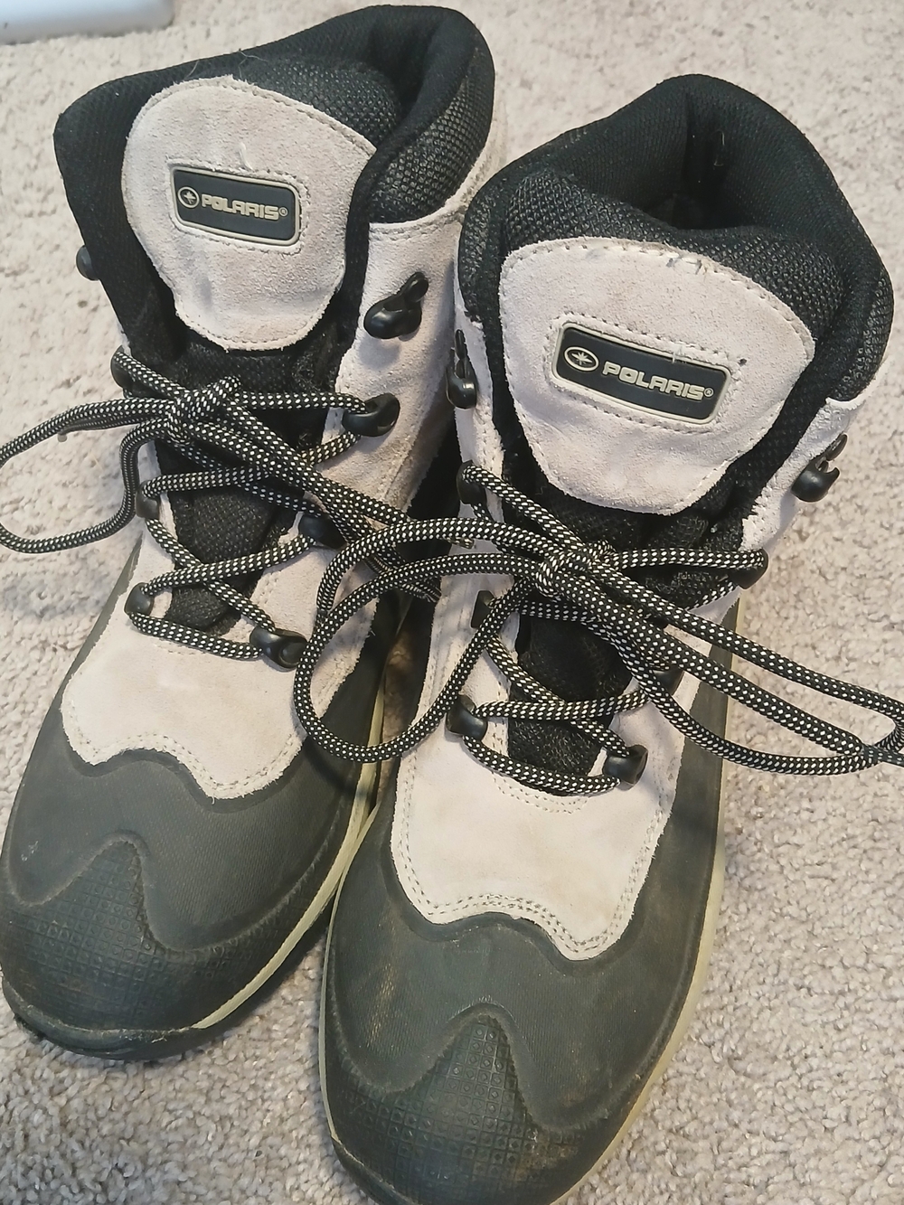 Polaris Thermolite hiking boots feature a gray suede upper with a blk rubber Sol